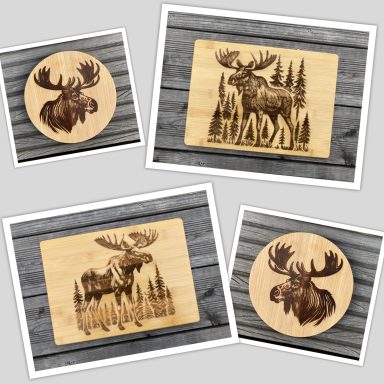 Holzbrett lasergraviert mit einem Elch Bild.